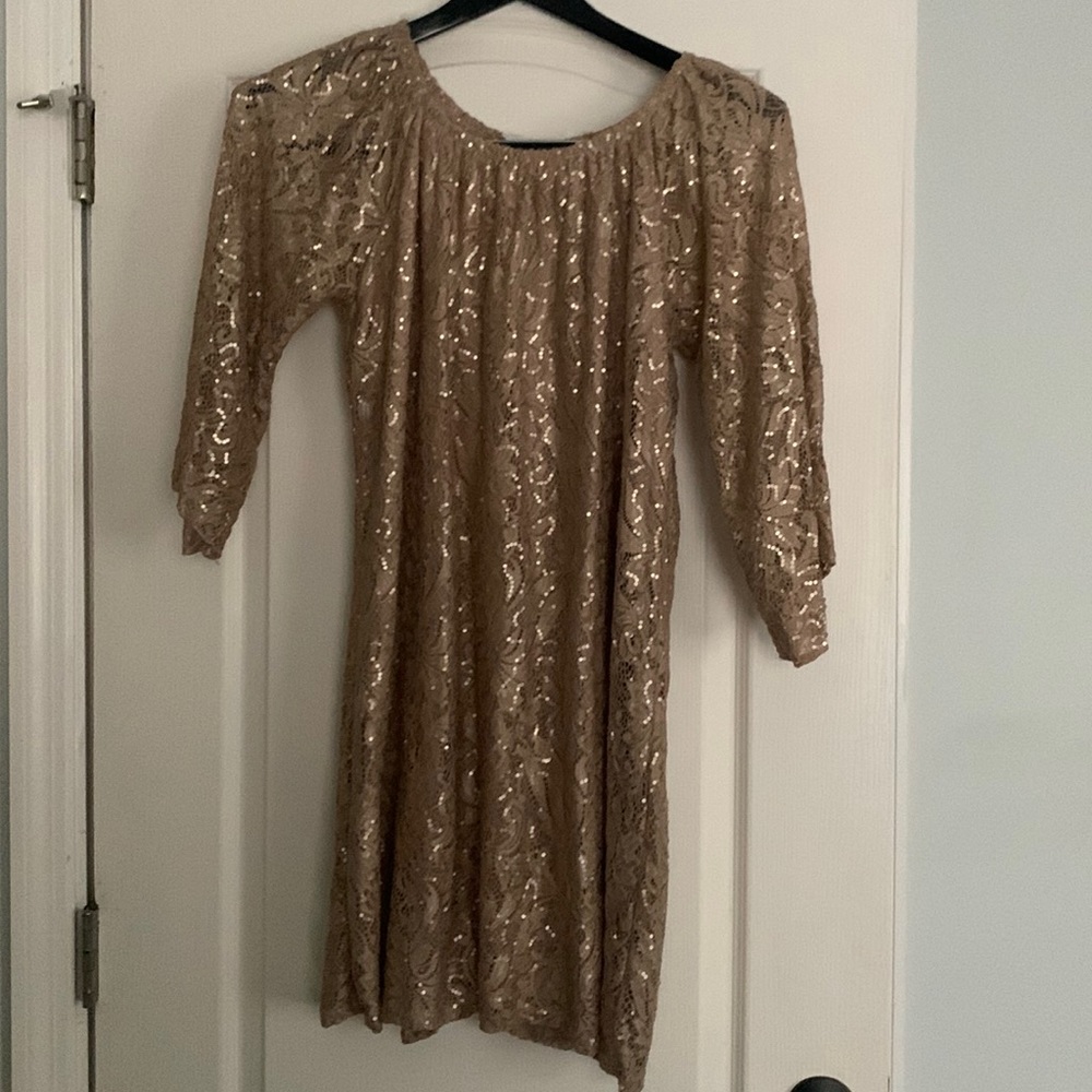 Beautiful sparkly tan colored dress. New without tags.